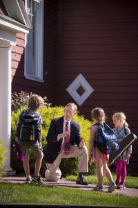 Head of school with kids