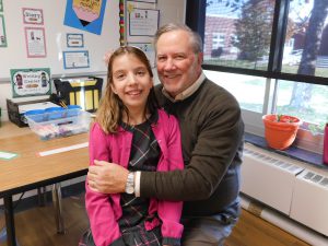 lower school student with grandfather