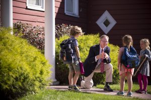Head of School with students