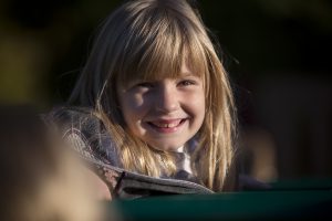 Lower School girl on playground