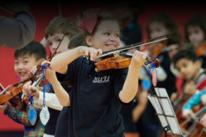 student playing violin